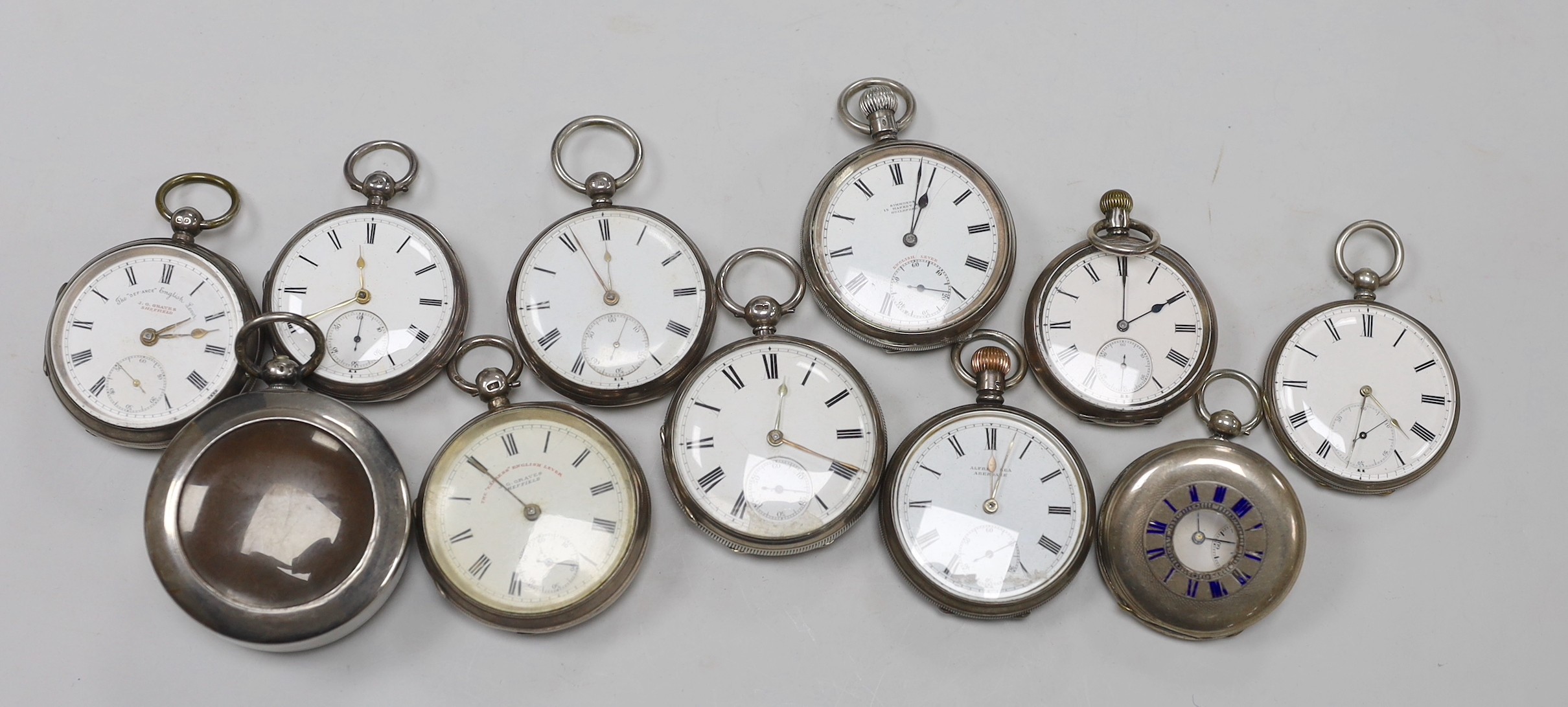 Eleven assorted Victorian and later silver or white metal pocket watches, including The Defiance English Lever, retailed by Graves of Sheffield and Joseph Taylor of Pontefract.